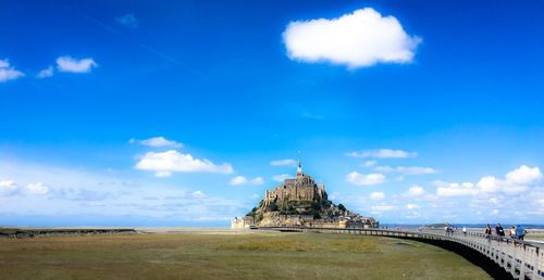 View of temple against cloudy sky