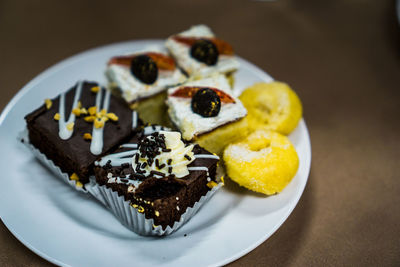 Close-up of cake served in plate on table