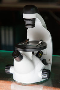 Classic scientist microscope. laboratory equipment concept. spain