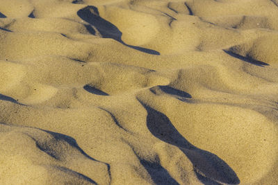 High angle view of shadow on sand