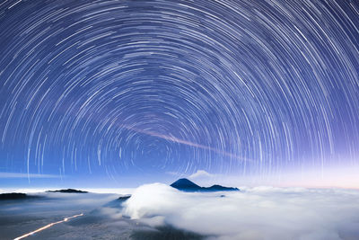 Scenic view of star field against sky at night