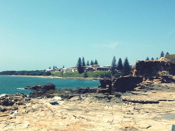 Scenic view of sea against clear blue sky