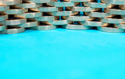 Close-up of blue objects over swimming pool