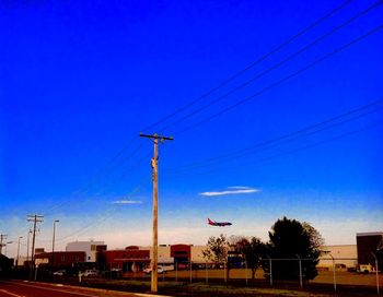 Low angle view of electricity pylon