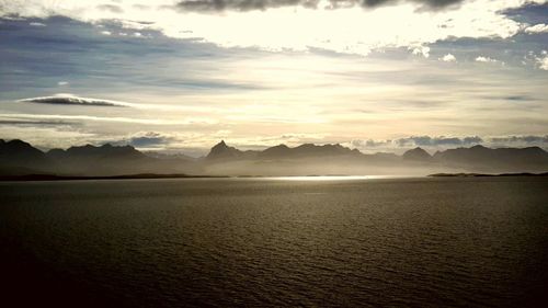 Scenic view of sea against cloudy sky