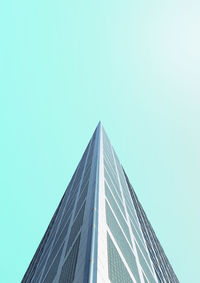 Low angle view of skyscraper against clear sky