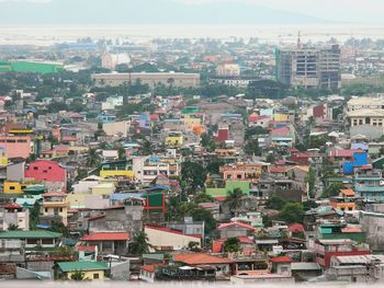 Aerial view of cityscape against sky