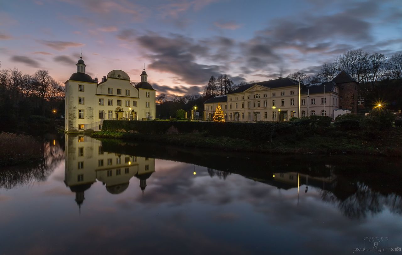 building exterior, built structure, architecture, reflection, water, cloud - sky, building, sky, waterfront, nature, residential district, illuminated, lake, no people, house, dusk, outdoors, city, standing water