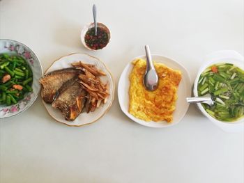 High angle view of food served on table