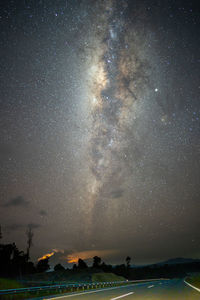 Scenic view of sea against sky at night