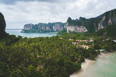 Panoramic view of sea and trees against sky in railay krabi