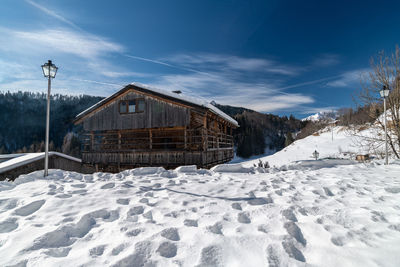 Historic village of sauris di sotto in the snow. winter dream. italy