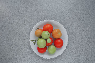 High angle view of fruits in bowl on table