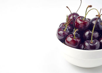 Close-up of fruits against white background