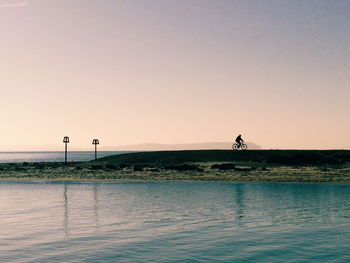 Scenic view of river against clear sky