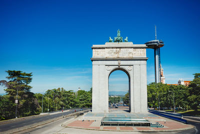 View of historical building against clear blue sky