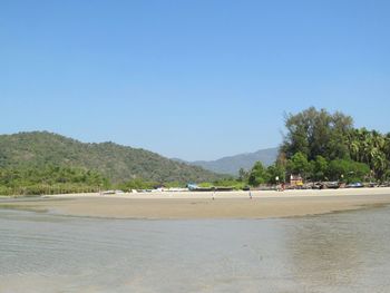 Scenic view of calm sea against clear sky