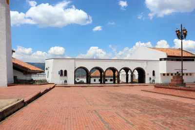 Exterior of historic building against sky in city