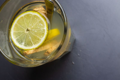 High angle view of lemon in glass on table