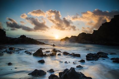 Scenic view of sea against sky during sunset