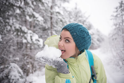 Portrait of woman in snow