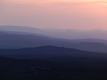 Scenic view of mountains at sunset