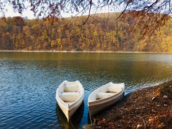Boats in lake during autumn