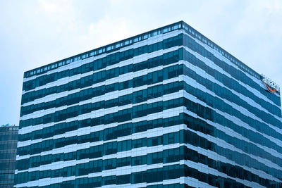 Low angle view of modern building against sky