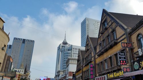 Low angle view of buildings against sky