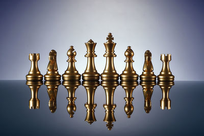 Close-up of chess pieces against the background