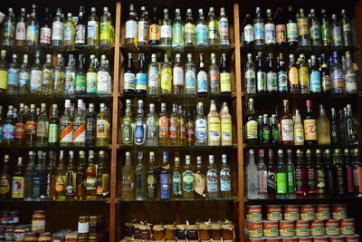 Full frame shot of glass bottles