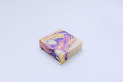 High angle view of paper over white background