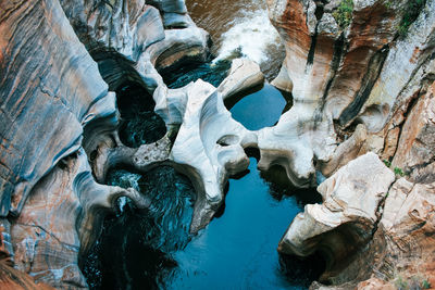 Low angle view of statue against rock formation