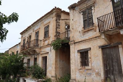 Low angle view of old building against sky