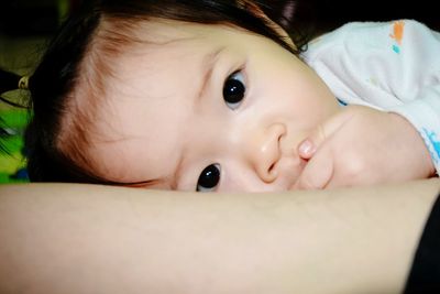 Close-up of cute baby at home