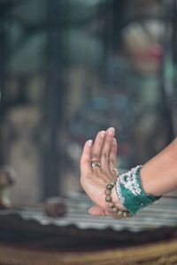 Cropped hand of woman dancing