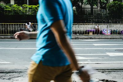 Man standing on road