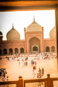 People in front of historical building