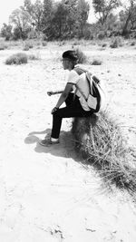 Man sitting on sand