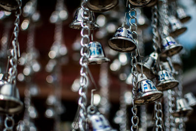 Close-up of metal hanging at market stall