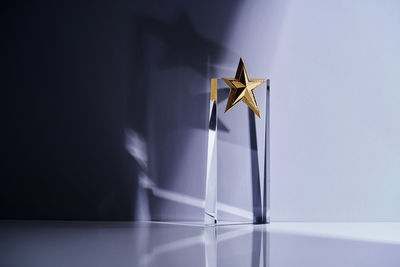 Close up of star shape glass or crystal trophy
