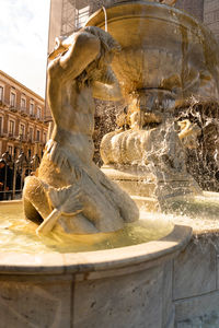 Statue of fountain in city