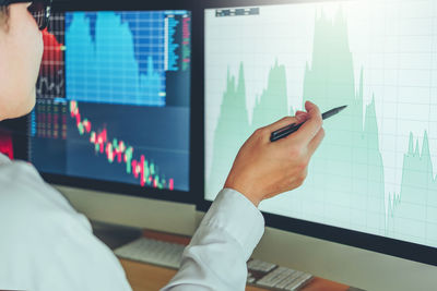 Cropped image of man working in office