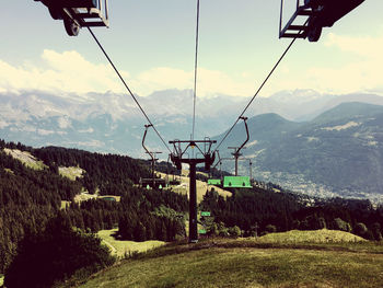 Overhead cable car over mountains