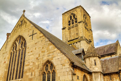 Low angle view of historic building against sky