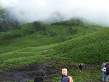 Scenic view of mountains in foggy weather