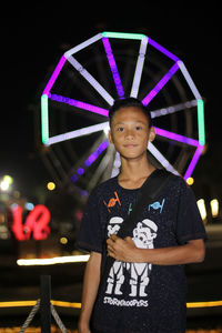 Portrait of smiling child at amusement park