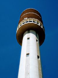 Low angle view of lighthouse against clear sky