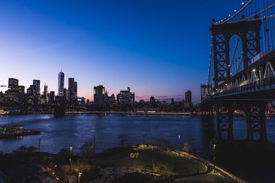 City lit up at waterfront