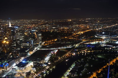 High angle view of illuminated city at night